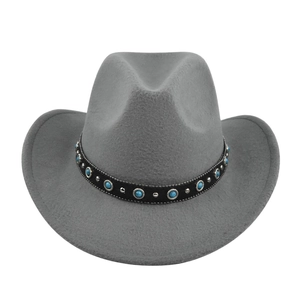 Detail of grey felt cowboy hat featuring black leather band with turquoise and silver studs