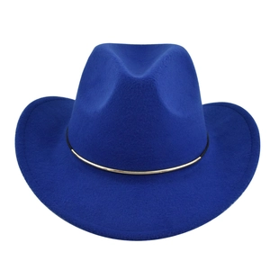 Detailed macro of royal blue felt fedora hat with gold metal band and wool texture