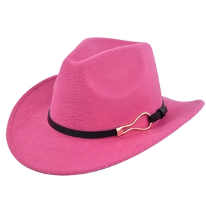 Close-up of bright pink felt cowboy hat featuring a black band with a gold metal buckle
