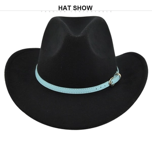 Detailed texture of black felt cowboy hat with light blue leather band and gold buckle