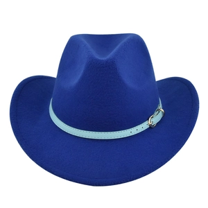 Macro detail of vibrant blue wool felt fedora with slim matching belt and gold buckle