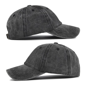 Zijaanzicht van vintage gewassen canvas honkbalpet met versleten rand en gebogen klep