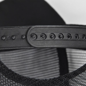 Detail of adjustable snapback closure and mesh fabric on black tiger baseball cap