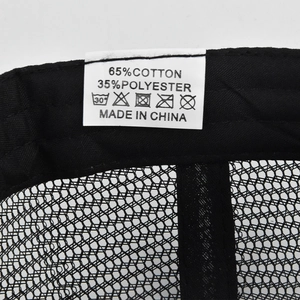 Detail of tiger baseball cap showing 65% cotton and 35% polyester material label