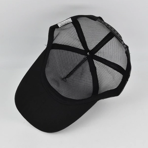 Detail view of the breathable black mesh back and cotton blend fabric on baseball cap