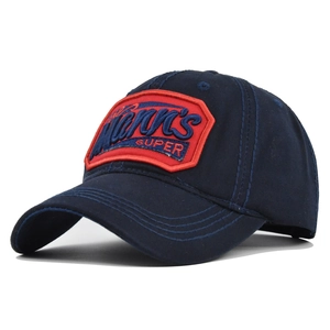 Detailed close-up of navy blue baseball cap featuring 3D Kevin's SUPER embroidery