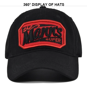 Macro detail of high-quality black cotton baseball cap with red embroidered Mann's Super logo