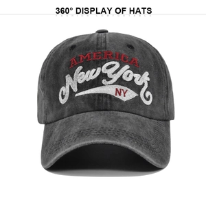 Close-up of vintage washed grey cotton baseball cap with New York embroidery details