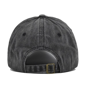 Close-up of washed cotton baseball cap back with adjustable antique bronze buckle