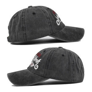 Detail of New York embroidery on washed charcoal grey cotton baseball cap