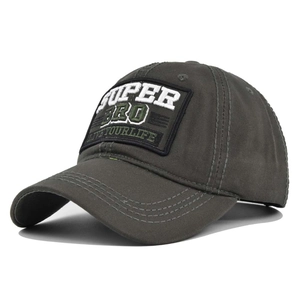Detailed close-up of charcoal gray baseball cap featuring 3D SUPER BRO embroidery patch