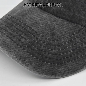 Detail van versterkte zesrijige stiksels op de gewassen grijze katoenen petrand