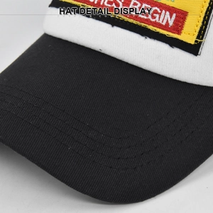 Close-up of Western 1985 baseball cap featuring yellow REGIN embroidery and precise stitching