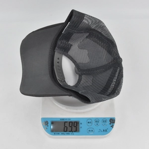 Detailed view of dark grey mesh trucker hat showing snapback closure and 69.9g weight