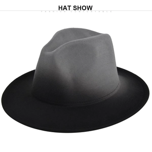 Close-up of the grey-to-black gradient wool felt fedora with a flat brim and wide crown