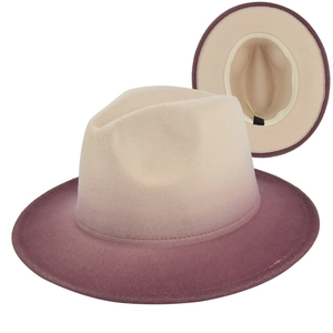 Detail view of gradient fedora hat showing cream top and pink brim with inner structure