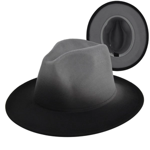 Detail of grey-black gradient fedora hat showing wide brim and inner sweatband