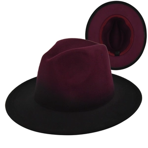 Detail showing wine red fedora hat with black brim and interior sweatband detail