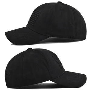 Detail showing 3D embossed American flag embroidery on black cotton baseball cap