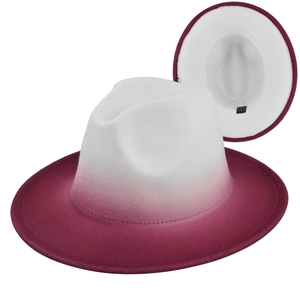 Detail of gradient fedora hat showing white to burgundy transition and inner lining