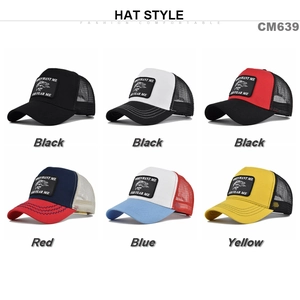 Detail view of mesh trucker hats with embroidered patches in multiple color combinations