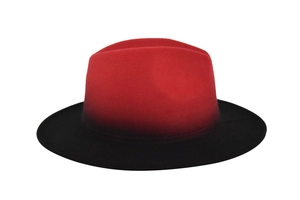 Detailed macro view of red and black gradient wool felt fedora with a flat brim