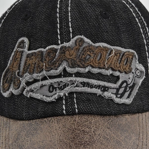 Vintage denim baseball cap with Americana embroidery and distressed brown leather brim