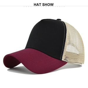 Detail of three-tone trucker hat with black cotton front and breathable beige mesh