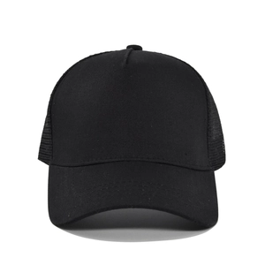 Front view of solid black five-panel trucker hat with breathable mesh and curved brim