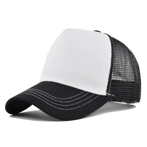Detail view of classic black and white trucker hat with mesh back and curved brim
