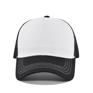 Detail view of the black and white trucker hat featuring breathable mesh and white stitching