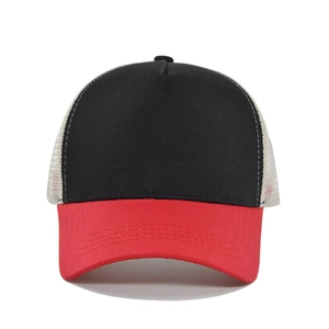 Detailed front view of a red and black color-block trucker hat with mesh back