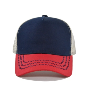 Detail of a color-block baseball cap with mesh back and red brim featuring wavy stitching