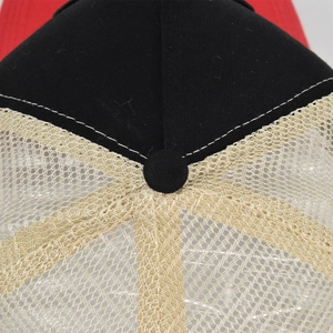 Detail of multi-color trucker hat featuring breathable mesh and reinforced top stitching