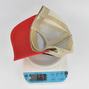 Detailed view of the embroidered baseball cap weighing 66.7 grams on a digital scale