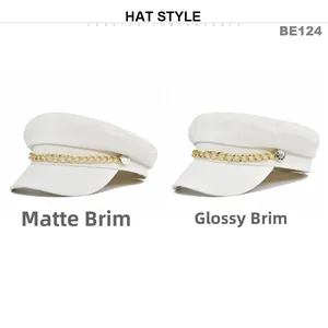 Detail comparison of white baker boy hats with matte and glossy brims and gold chains