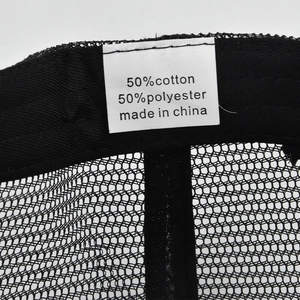Detail of internal wash care label showing 50% cotton and 50% polyester blend