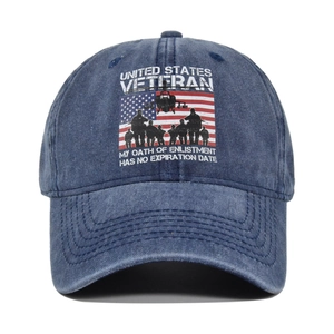 Close-up of military-style graffiti on navy washed cotton vintage baseball cap