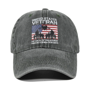 Close-up of charcoal grey veteran baseball cap showing American flag and soldier graphics
