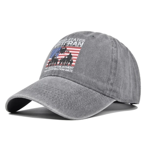 Close-up of vintage grey cotton baseball cap with United States Veteran military print