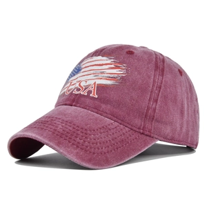 Close-up of vintage washed burgundy baseball cap with USA embroidery and stars and stripes
