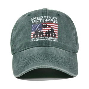 Detailed macro view of vintage washed green cotton canvas cap with veteran embroidery