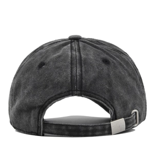 Close-up of the adjustable metal buckle and vintage washed fabric on the baseball cap