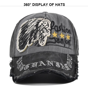 Vintage washed baseball cap with skull embroidery and distressed brim details
