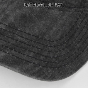 Macro detail of the curved brim on a distressed washed cotton graffiti baseball hat