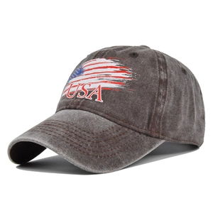 Detail of USA embroidery and star pattern on charcoal grey washed cotton baseball cap