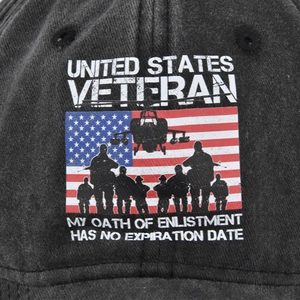 Detailed macro view of military veteran embroidery on a washed black cotton baseball cap
