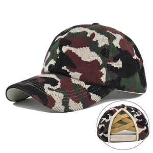 Detail of knit camo ponytail baseball cap with criss-cross elastic bands back design