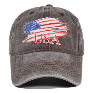 Detailed close-up of washed cotton fabric texture and USA flag print on baseball cap