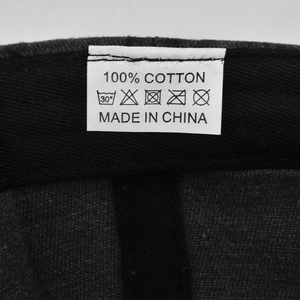 Detailed view of the 100% cotton wash label inside the distressed graffiti baseball cap